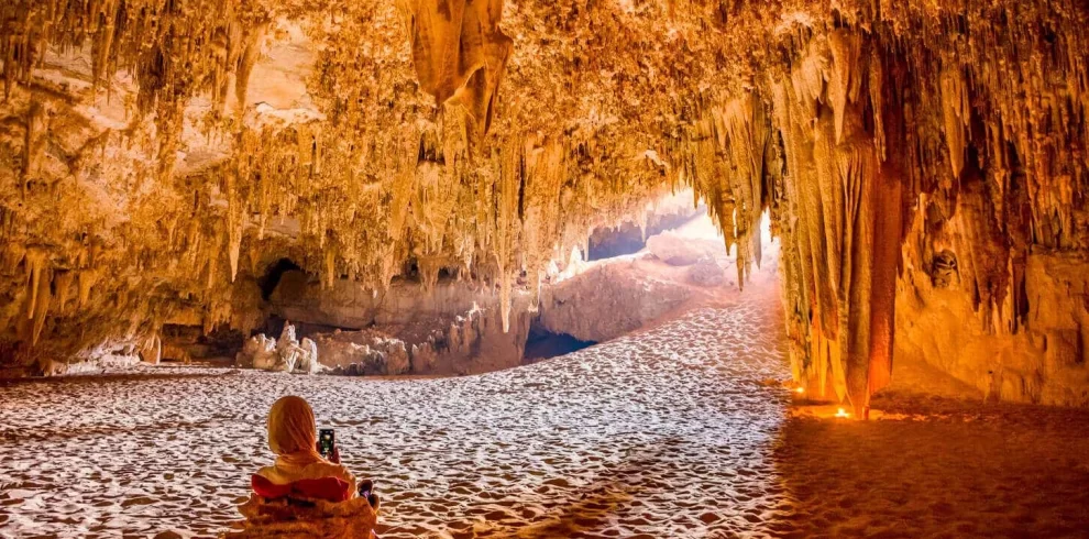 wonderful photo of a girl from the inside of the Djara cave in the Bahariya