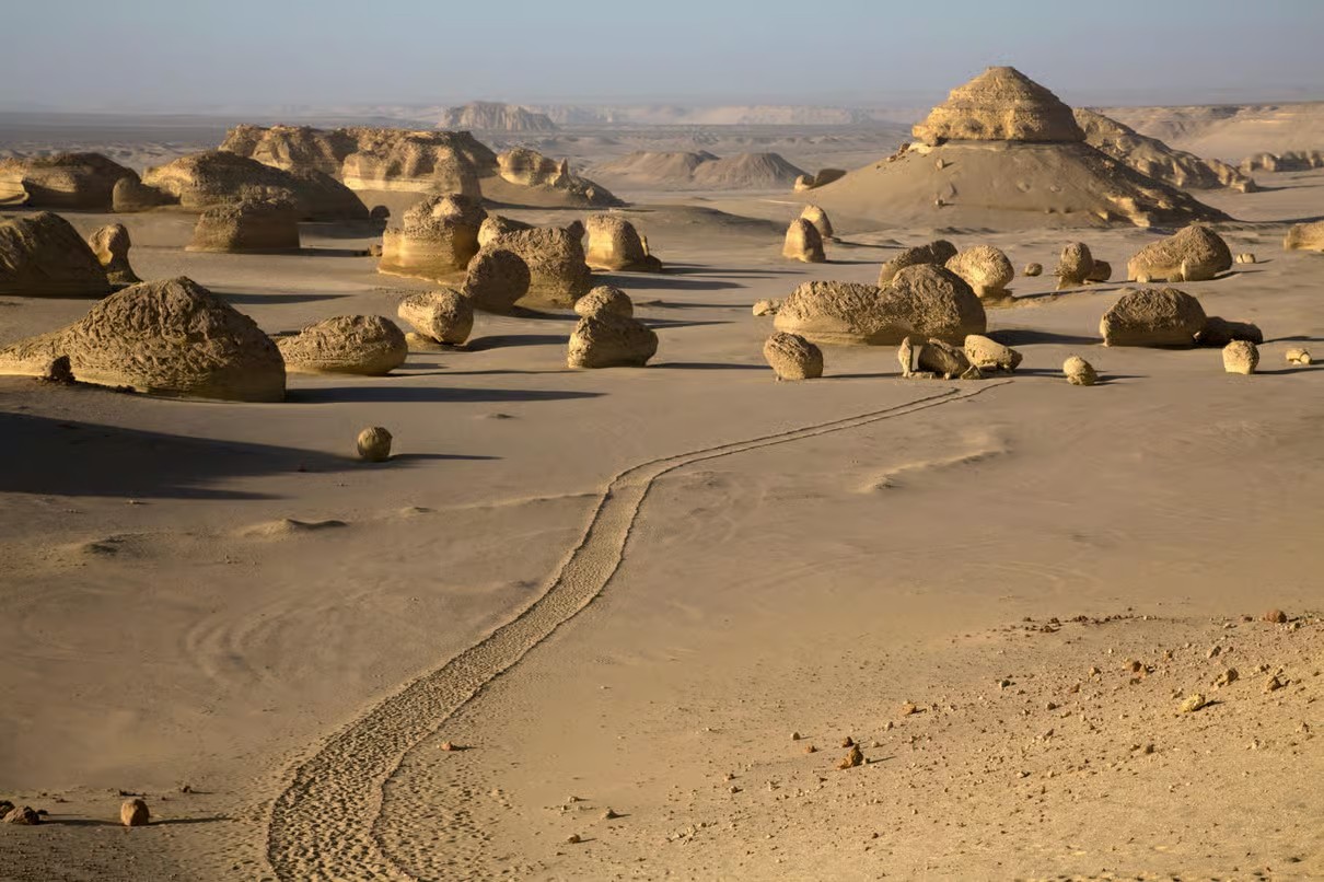 Fayoum Egypt landscape with Magic Lake, Wadi El Rayan waterfalls, desert mountains and Tunis Village scenery