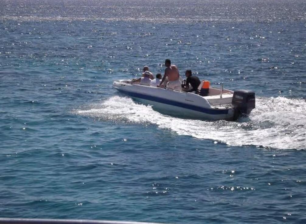 Tiran Island near Sharm El Sheikh with turquoise Red Sea waters, coral reefs and beautiful coastal scenery