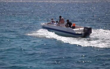 Tiran Island near Sharm El Sheikh with turquoise Red Sea waters, coral reefs and beautiful coastal scenery