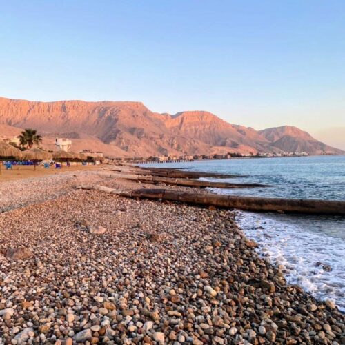 Ain Sokhna Red Sea beach day trip from Cairo with swimming, sunbathing, and relaxing seaside views.