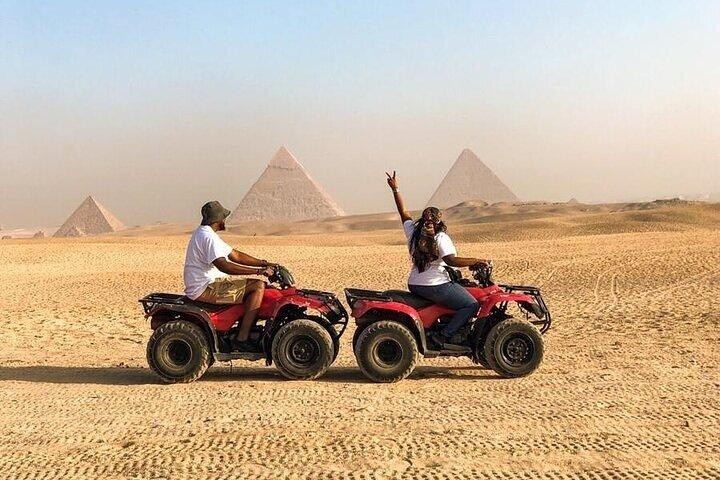 ATV Quad Bike Adventure at the Giza Pyramids in Egypt with Stunning Desert Views and Photo Opportunities.