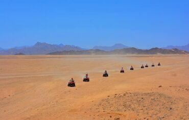 Hurghada desert safari at sunset with golden sand dunes and beautiful Egyptian desert landscapes
