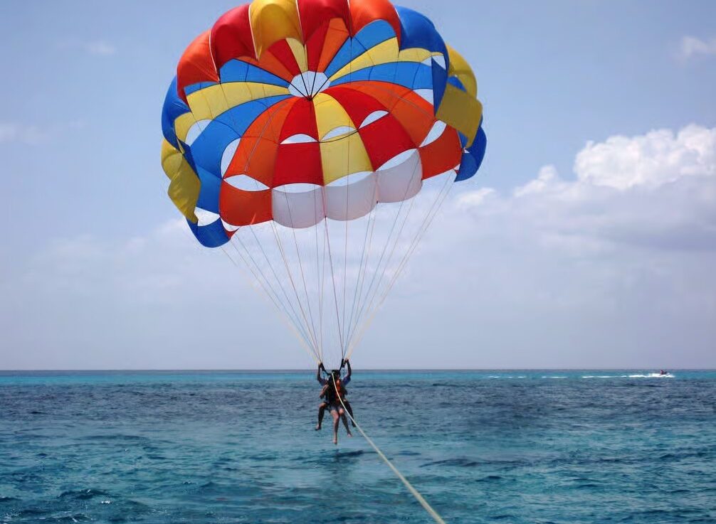 Sharm El Sheikh water sports experience on the Red Sea with parasailing, sea rides and beautiful coastal scenery